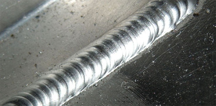 Close-up of aluminum TIG weld bead showing clean setup results