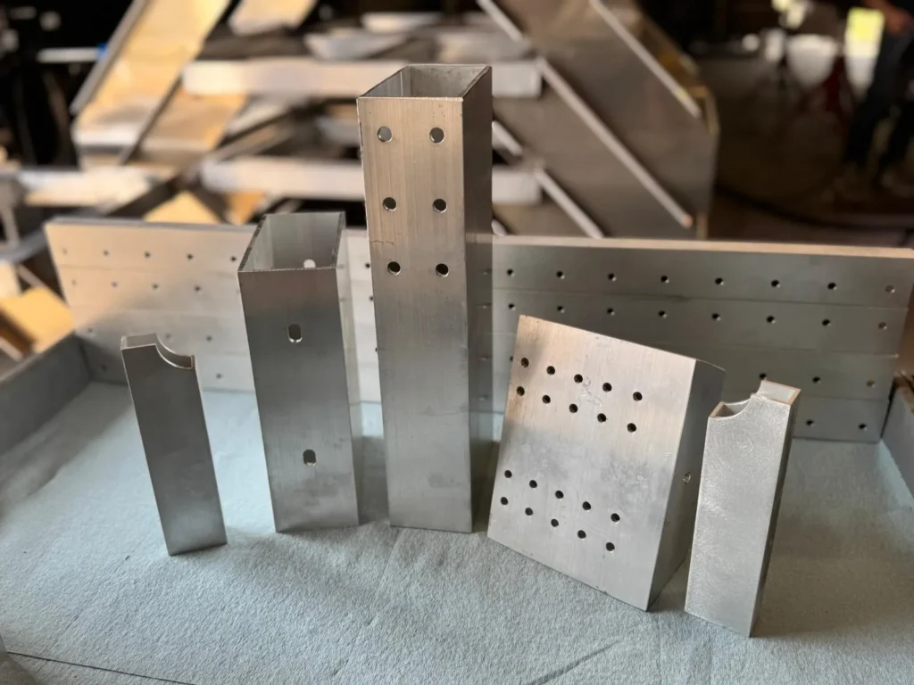 Custom aluminum parts produced with tube laser cutting at Performance Aluminum Fabrication