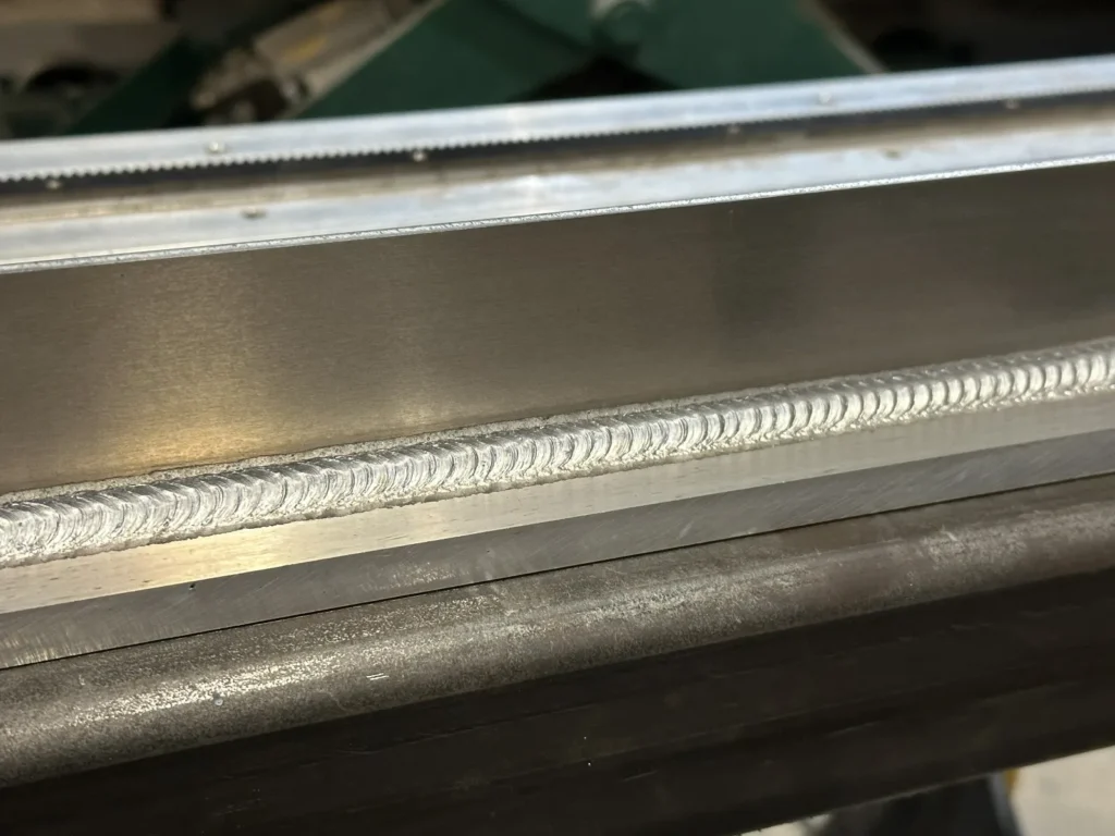 aluminum welding seam with clean weld bead for beginner’s guide
