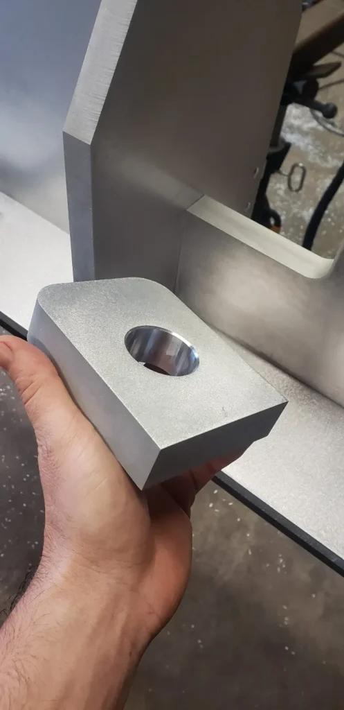 CNC machined aluminum part for custom fabrication project